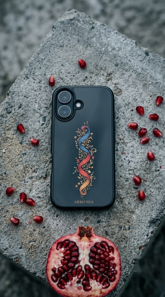 NRAN Armenia phone case on concrete with pomegranate seeds